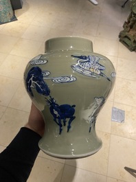A Chinese blue, white and copper-red celadon-ground 'birds and deer' vase, Kangxi
